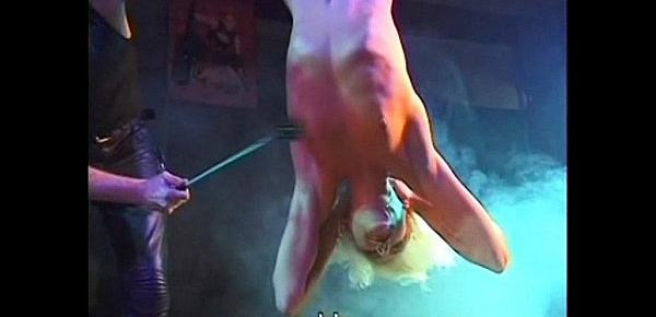  Fetish Club Punishment On Stage of blonde slavegirl in bondage and whipping